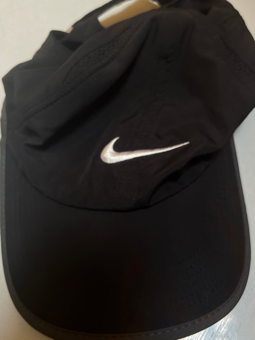 Nike Black Featherlight Dri-FIT Performance Cap with Embroidered White Swoosh